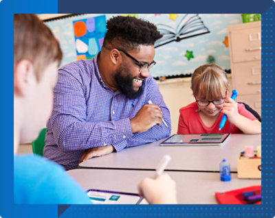 A man and a girl sitting at a table.