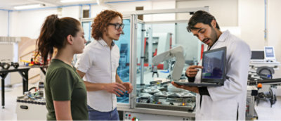 A group of people standing in a Laboratory