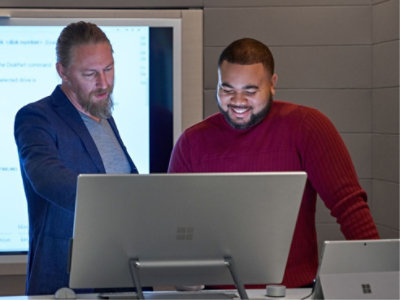 Two people discussing something on system