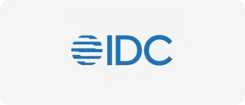 Logo van international data corporation (idc) tegen een witte achtergrond.