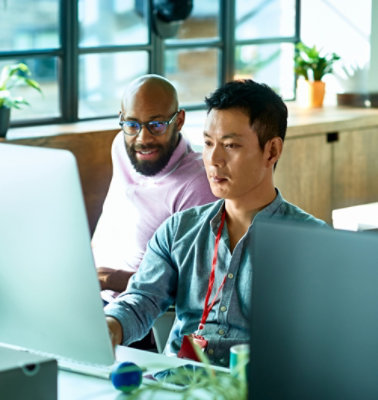 Two man's working on computer