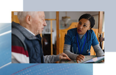 A nurse talking to a man.