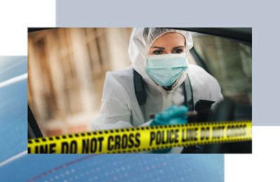 A close-up of a yellow tape with black text reading LINE DO NOT CROSS POLICE LINE COMPANY.