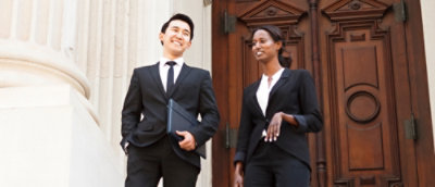 A man and woman in suits.