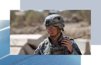 A militery person speking on phone.