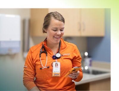 A person wearing an orange shirt with a stethoscope around their neck; text reading 2024 is visible.