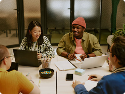A group of people sitting around a table