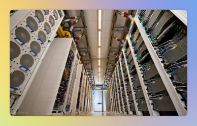 A room with white cabinets and wires