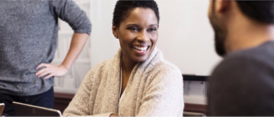 A woman smiling at the camera.