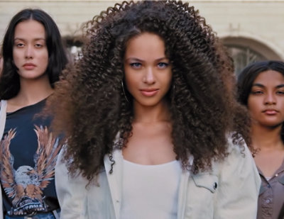 A curly haired woman