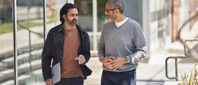 A man talking to another man.