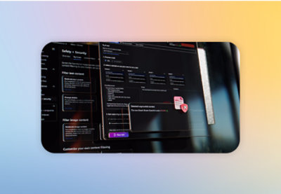 A screenshot of a computer screen displaying text and a partial image of a pink and white paper.