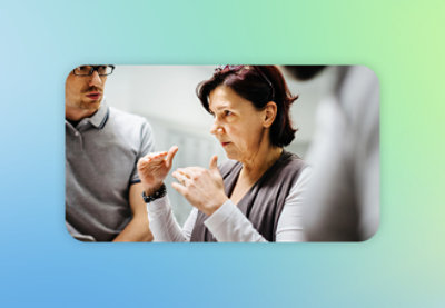 A woman and man talking