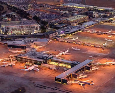 An aerial view of an airport at night.