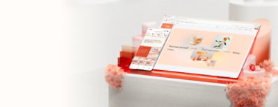 A tablet and a smartphone are displayed on a white surface with pink and white decorative elements