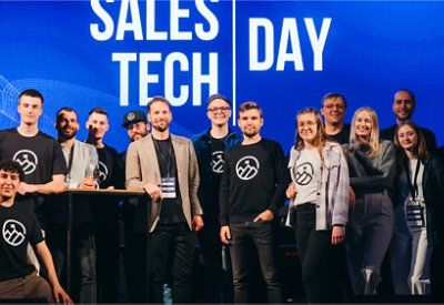 A group of people gathered at a table in a conference room