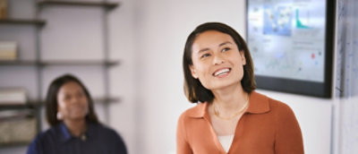 A close-up of a woman smiling.