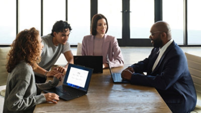 a group of people discussing.