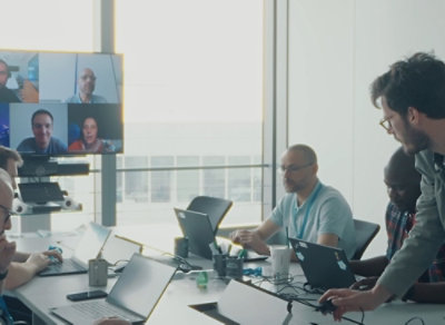 A group of people sitting at a table.