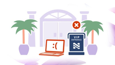 A laptop and a blue sign with white text displayed near palm trees.