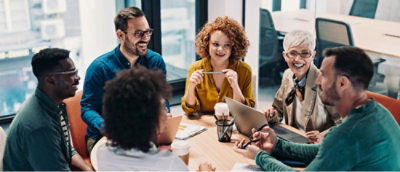 group of people sitting and discussing something