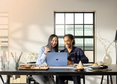 two women listening in a conference
