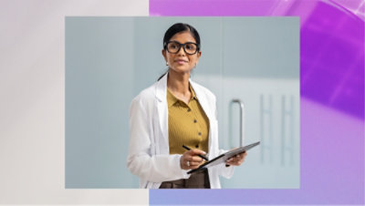 A person in a white coat holding a clipboard and pen.