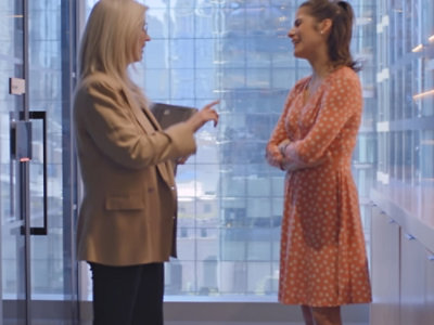 Two women talking each other