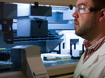 A close-up of a person's neck and shirt.