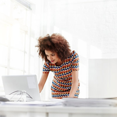 A woman working on a laptop