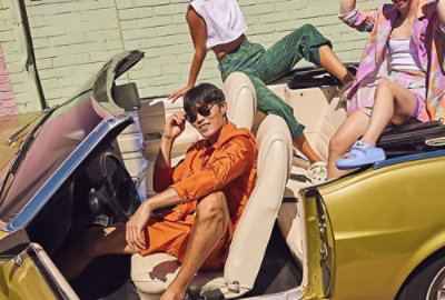 A group of people setting on a car