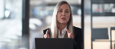 A women and a man looking at each other and smiling