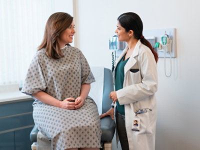 A patient and a doctor talking to each other.