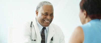 A close-up of a person smiling.