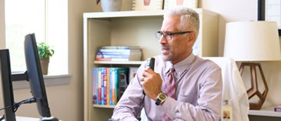 A person holding a microphone.