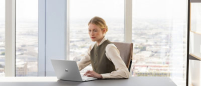 A woman working on a laptop