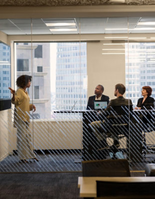  A woman standing in front of a group of people