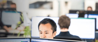 Picture of a man behind the screens