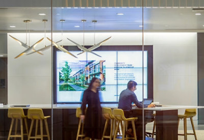 A man and woman sitting at a table.