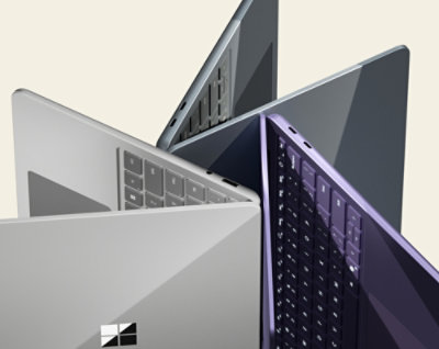 A close-up of several different colored electronic devices.