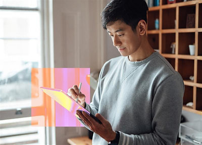 A man scrolling on tab.