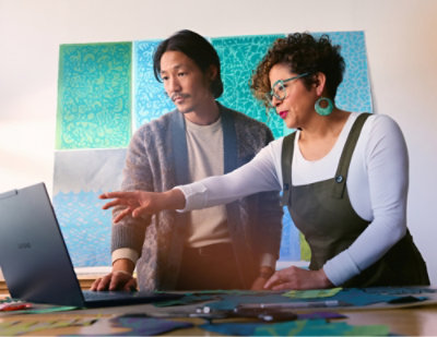 A person wearing headphones and using a computer at a desk.