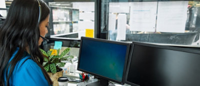 A computer on a desk.