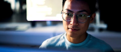 A man wearing glasses.