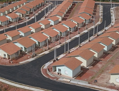 A group of houses with red roofs.
