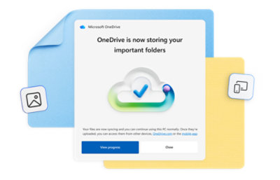 OneDrive notification shows message about storing important folders, with cloud checkmark icon and 'View progress' option.