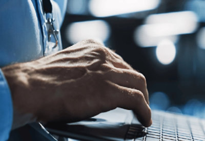 A man hand working on laptop