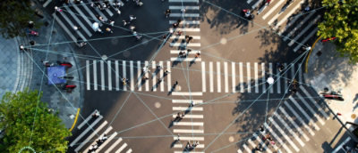 Overlaid on the scene are blue lines and connection points, forming a network-like pattern.