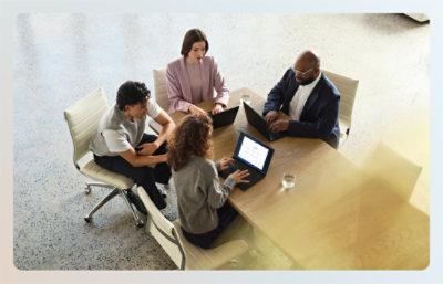 People sitting around a table and discussing