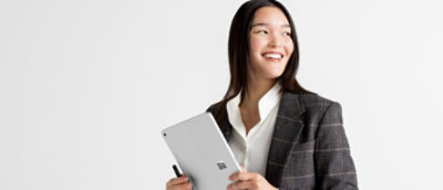 A person holding a tablet.